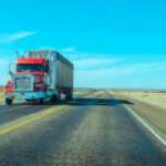 Logistics - Red truck transporting goods